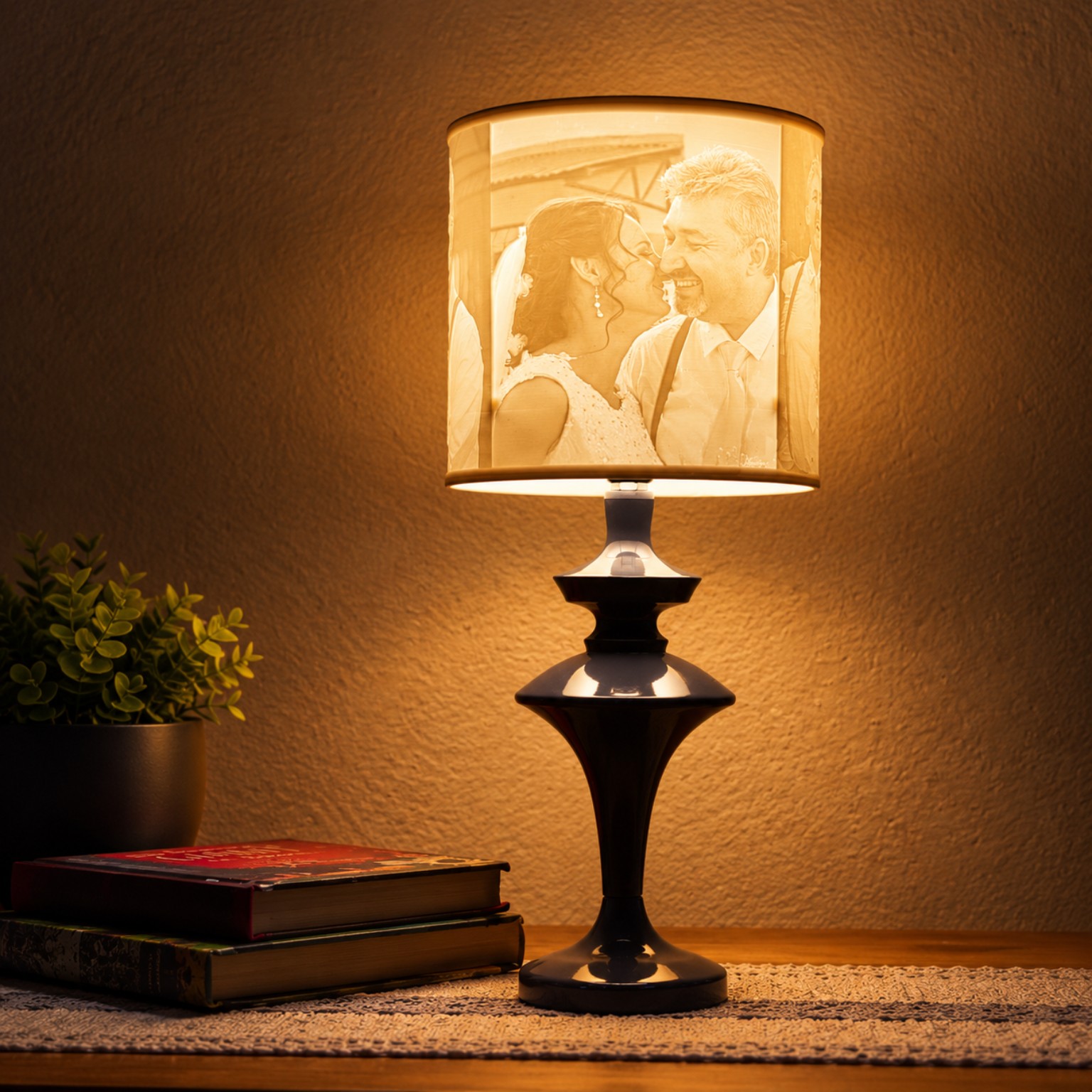 A real Sammy & Me personalised photo lamp glowing with a wedding photograph on a bedside table